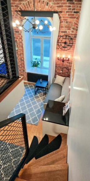 Stylish historic loft - your comfy Old Town stop!
